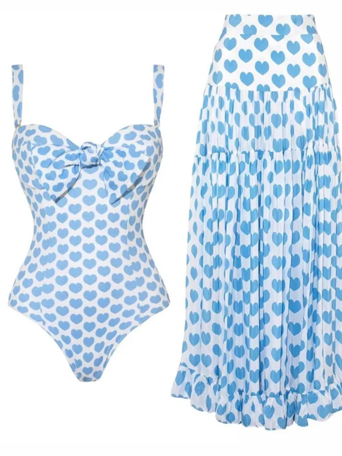 Pastel blue printed one-piece swimwear with matching skirt set by Trendsi, stylish and comfortable for beach or pool days.