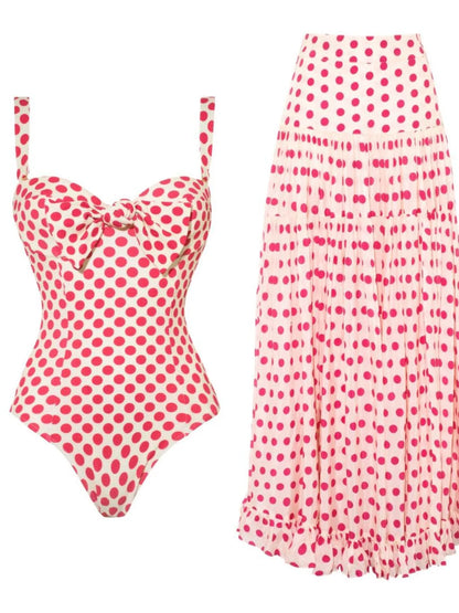 Pastel blue printed one-piece swimwear and skirt set by Trendsi, featuring a stylish and comfortable beachwear ensemble.