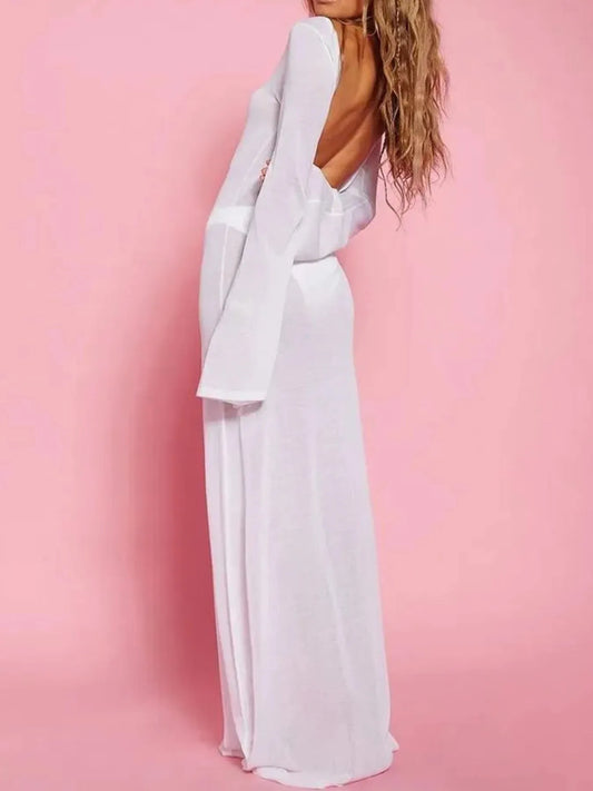 White backless long sleeve maxi cover-up from Trendsi, stylish swimwear with a flowy, elegant design for beach or poolside.
