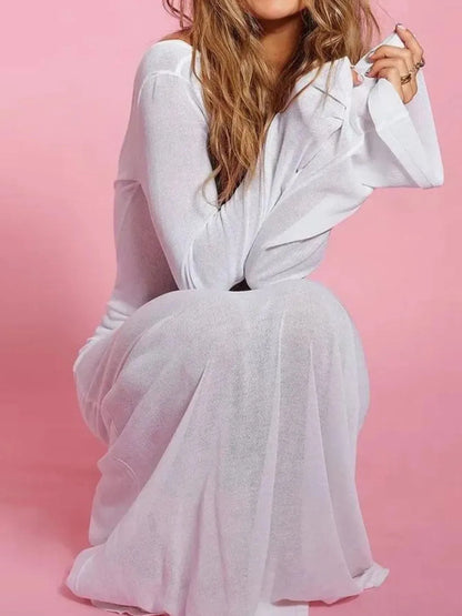 White backless long sleeve maxi swimwear cover-up by Trendsi, flowing fabric perfect for beach or poolside fashion.