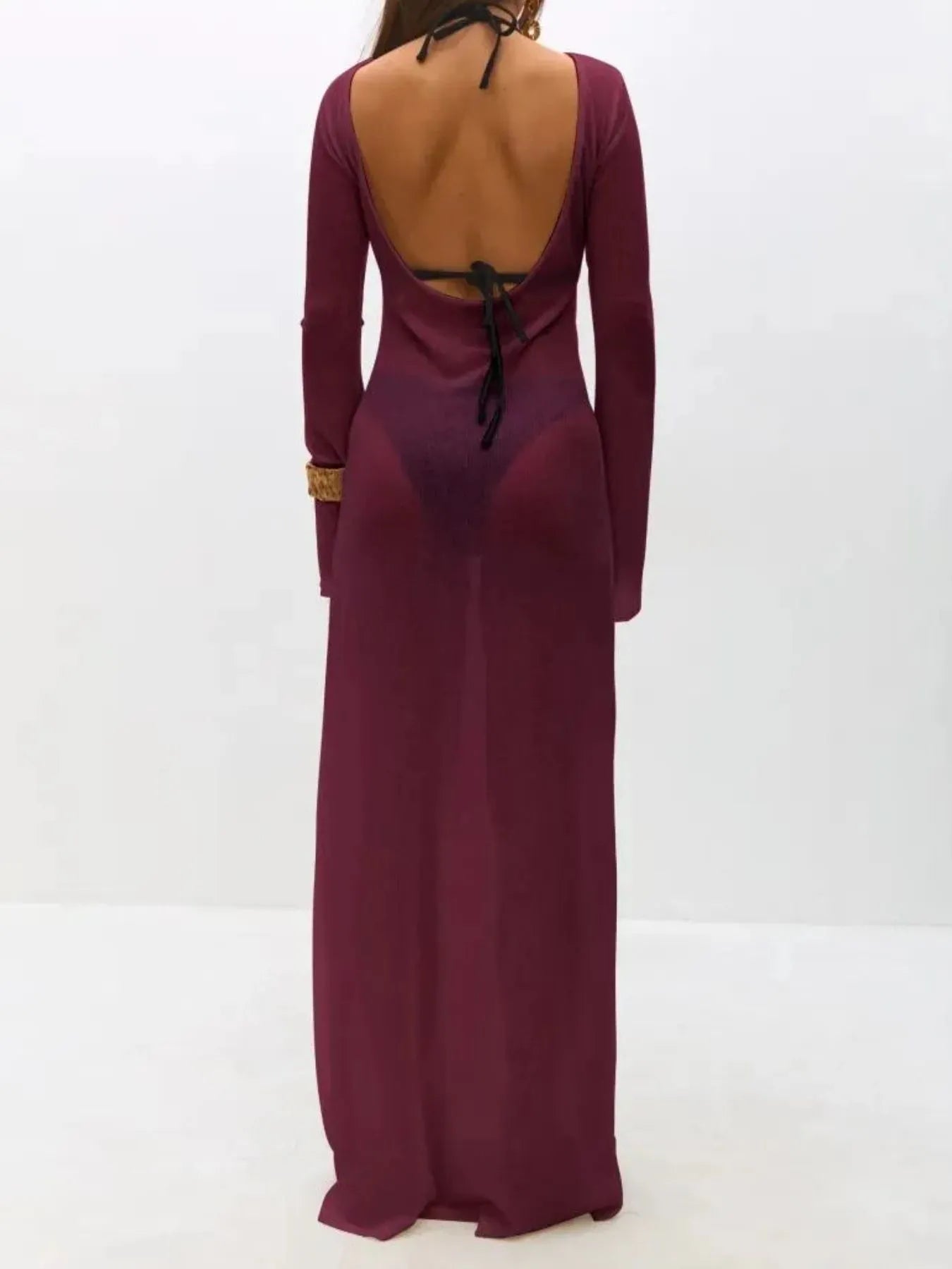 White backless long sleeve maxi swimwear cover-up by Trendsi, flowing lightweight fabric perfect for beach or poolside wear.