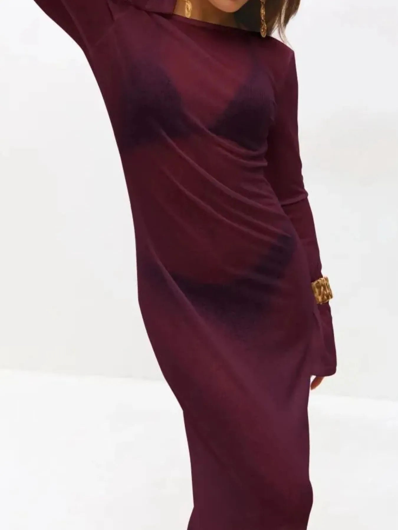 White backless long sleeve maxi cover-up from Trendsi, stylish swimwear with flowing fabric and elegant design.