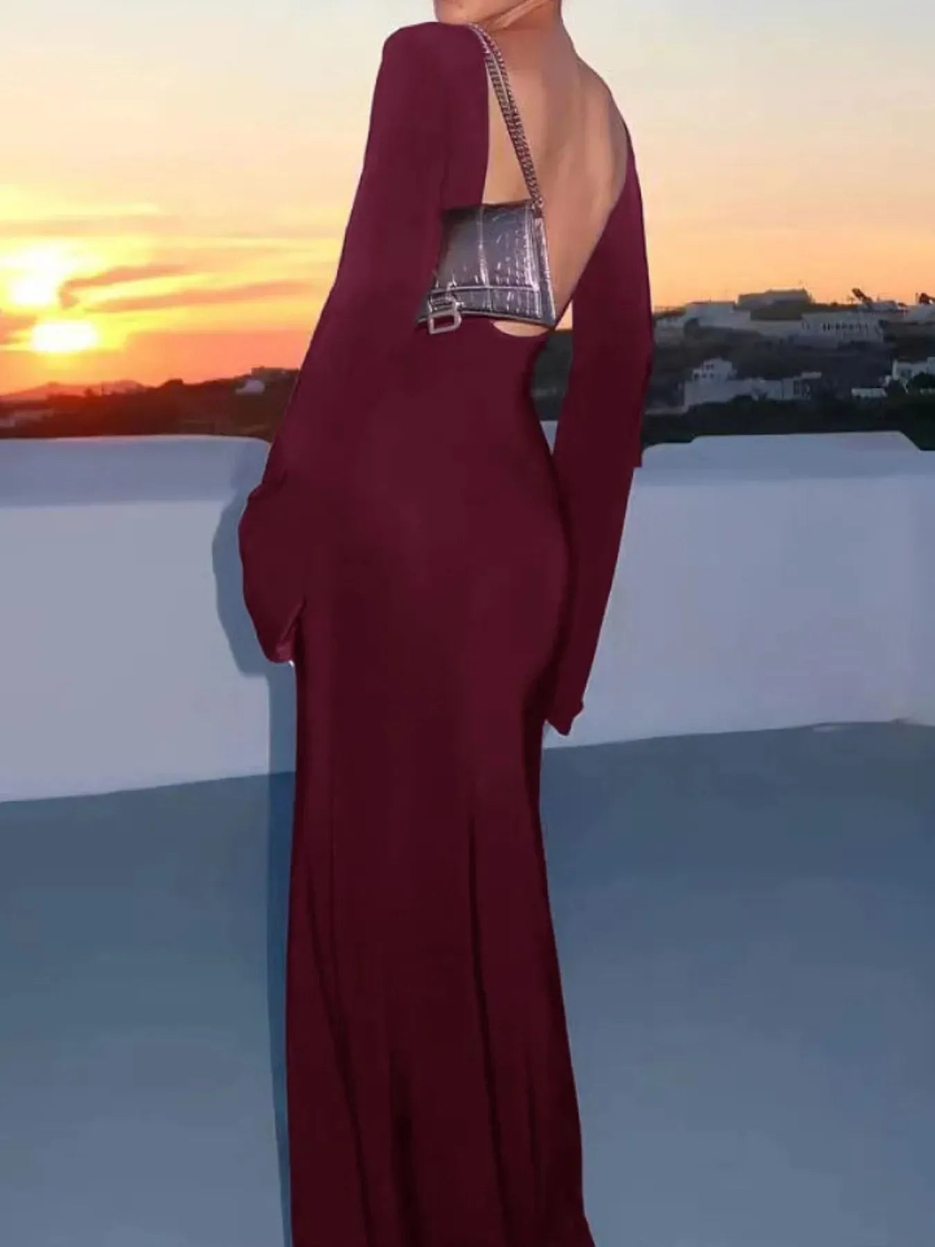 White backless long sleeve maxi cover-up swimwear by Trendsi, flowing design perfect for beach and poolside wear.