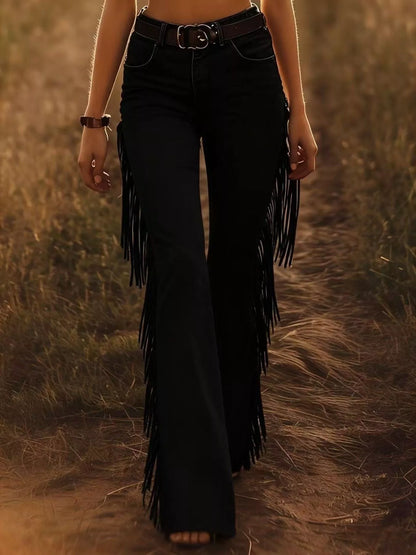 Trendsi fringe trim flare pants with wide legs and decorative fringe detail, shown in a natural pose.