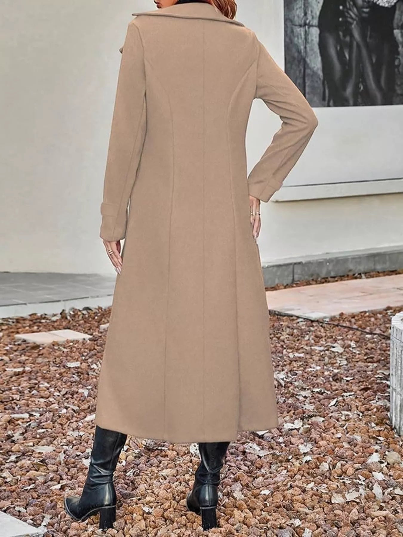 Plus size tan double-breasted longline trench coat from Trendsi, shown on model with classic collar and belted waist.