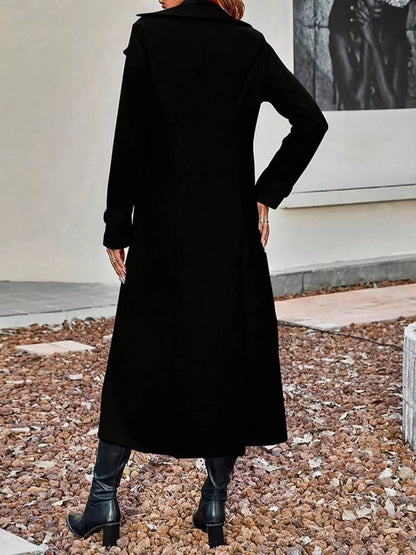 Plus size tan double-breasted longline trench coat by Trendsi, featuring a classic style and tailored fit.