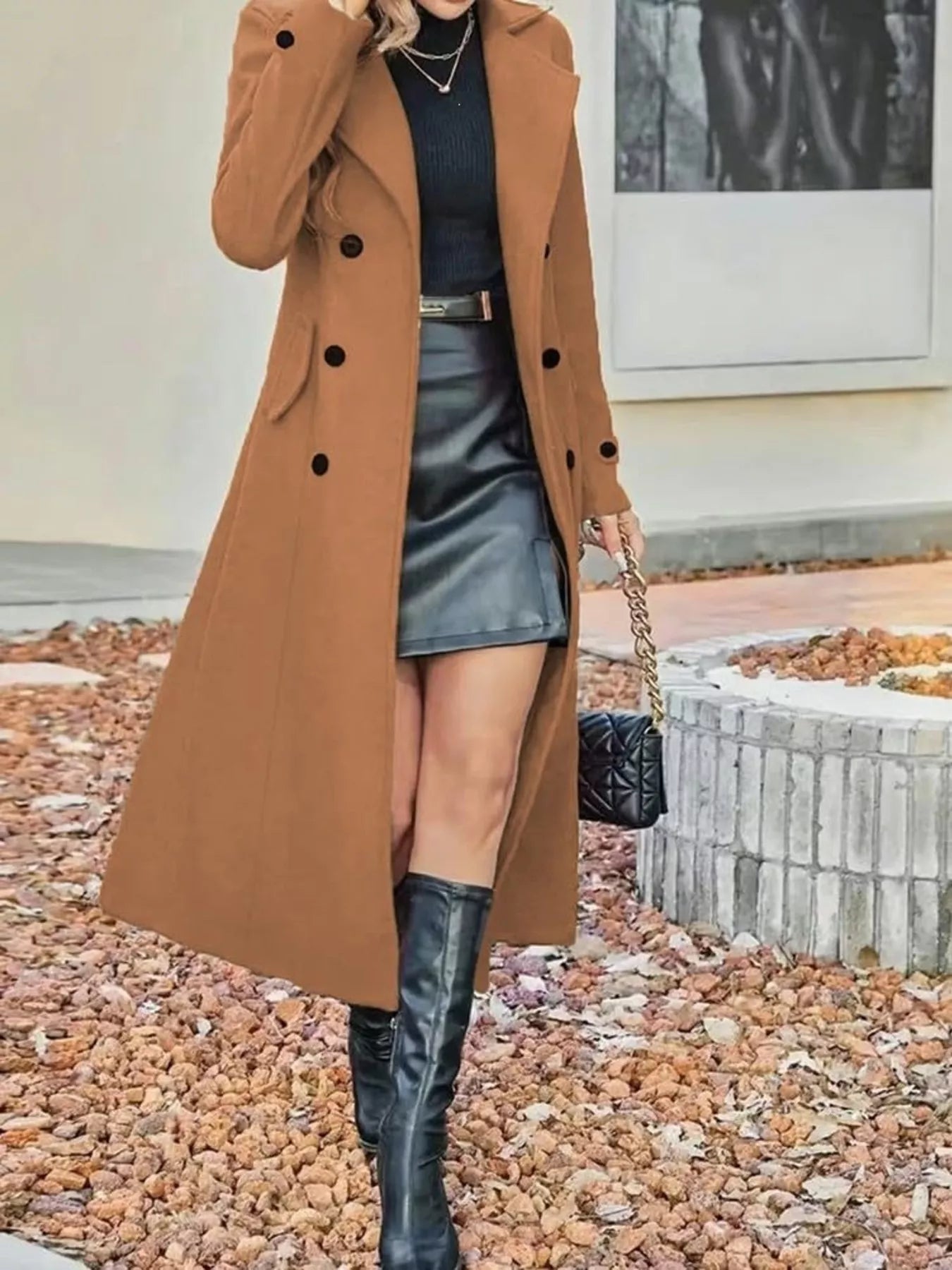 Plus size tan double-breasted longline trench coat by Trendsi, featuring a classic style and tailored fit.