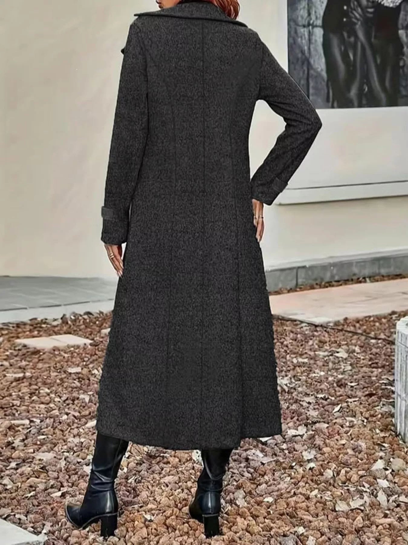 Plus size tan double-breasted longline trench coat by Trendsi, shown on a hanger with classic collar and button details.