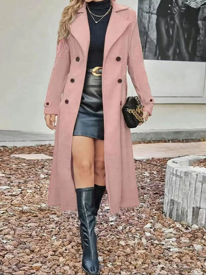 Plus size tan double-breasted longline trench coat by Trendsi, featuring classic style and tailored fit for a sophisticated look.