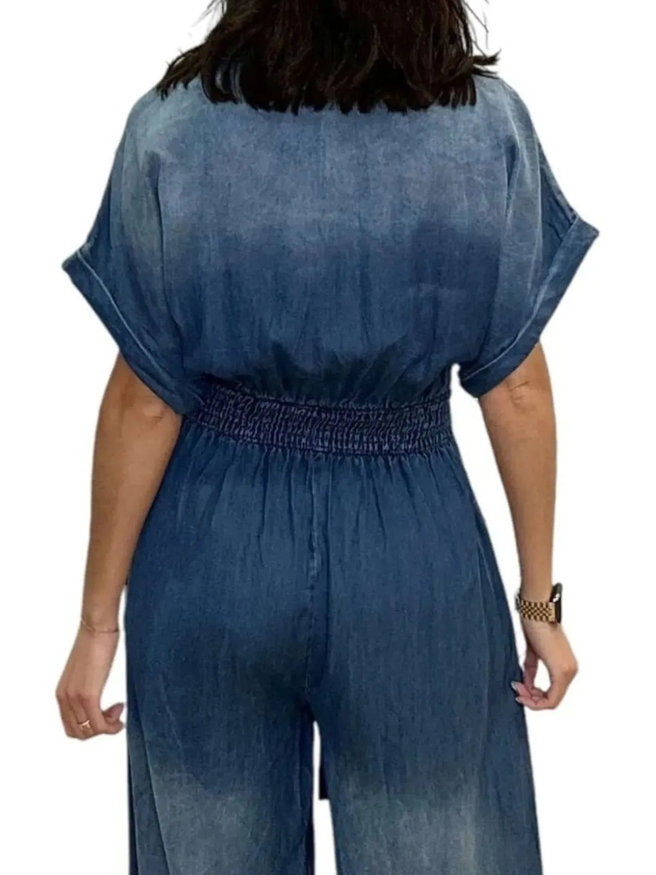 Vintage blue button-front wide-leg denim jumpsuit by Trendsi, featuring a classic fit and stylish design.
