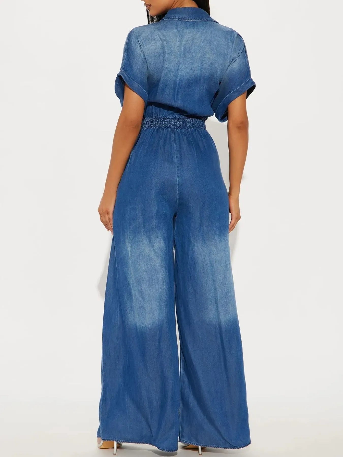 Vintage blue button-front wide-leg denim jumpsuit by Trendsi, featuring a classic fit and stylish design.