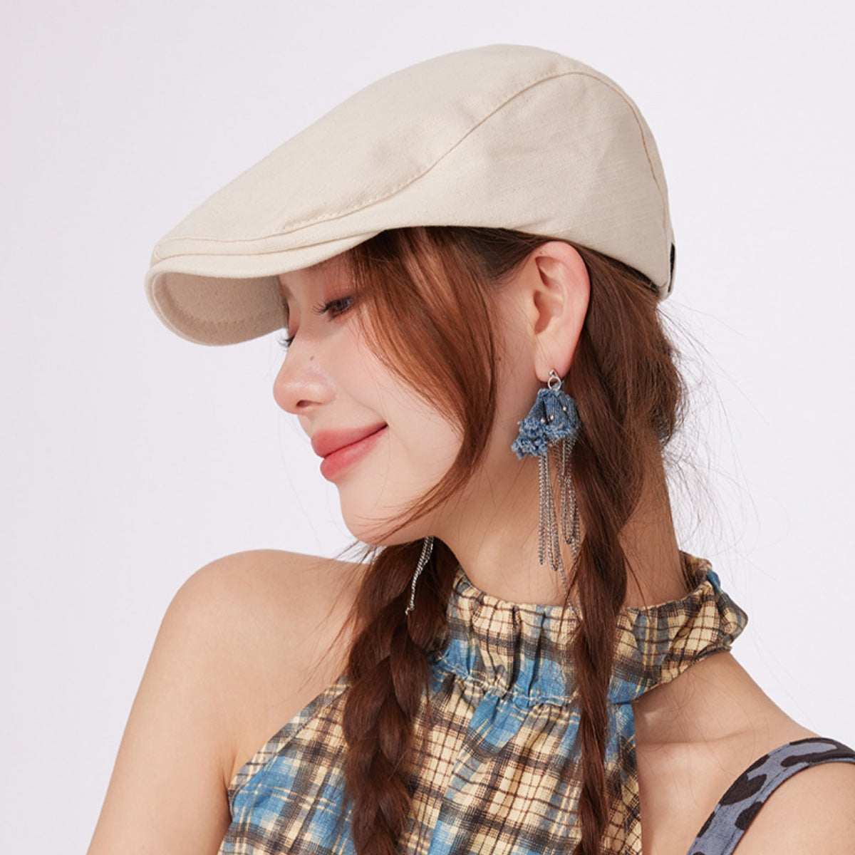 Gray classic solid color newsboy cap by Trendsi, featuring a rounded brim and vintage style for casual or stylish wear.