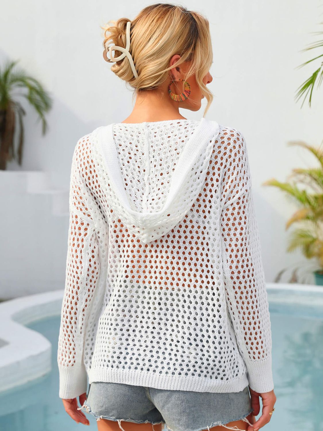 White angel wings floral cover-up by Trendsi featuring sheer fabric and delicate floral details for summer style.