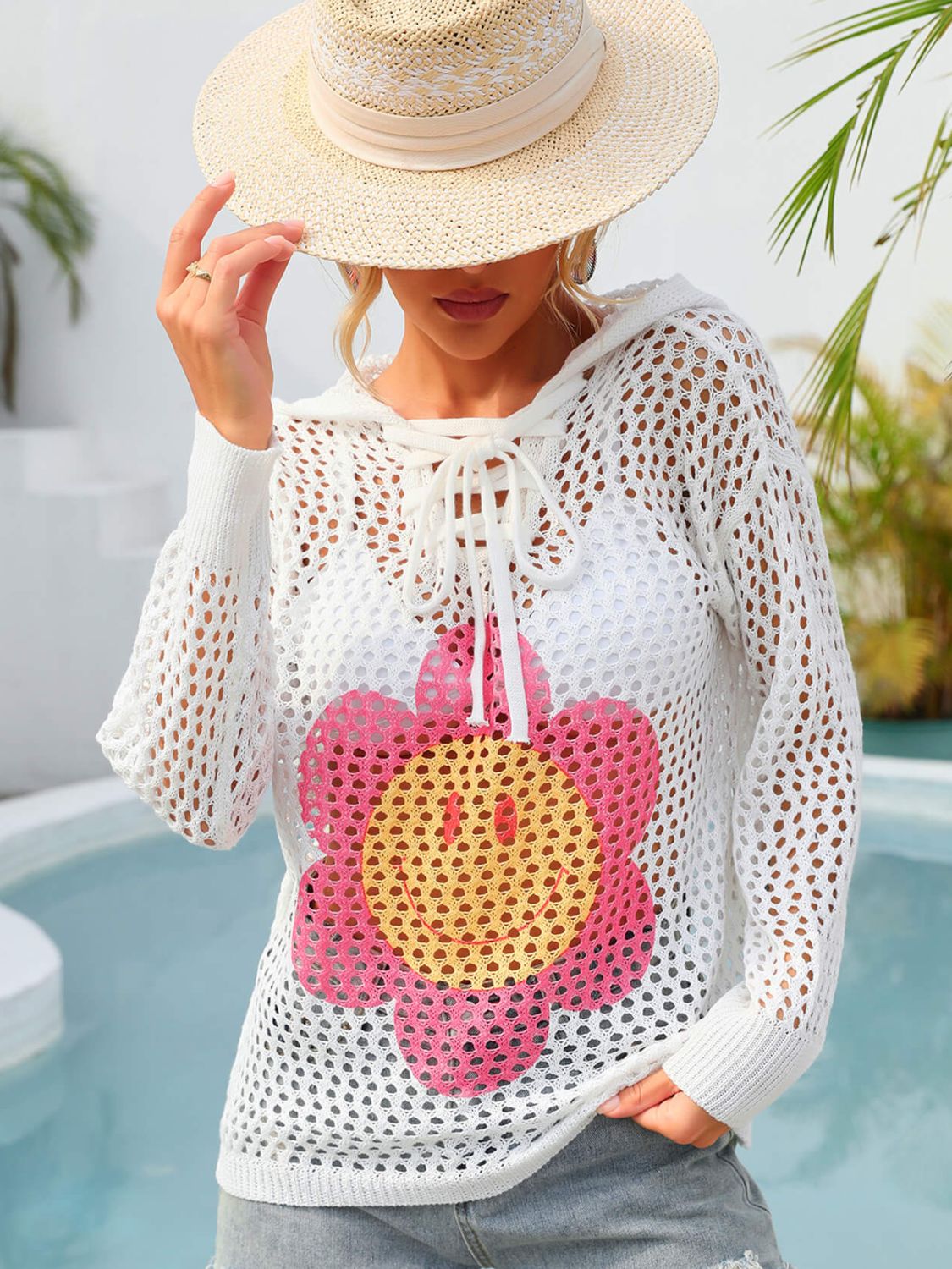 White angel wings floral cover-up by Trendsi, featuring sheer fabric and intricate floral details for stylish summer wear.