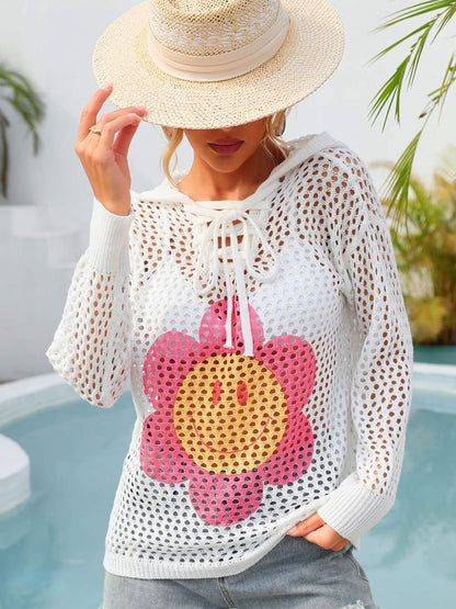 White angel wings floral cover-up by Trendsi, featuring sheer fabric and intricate floral details for stylish summer wear.