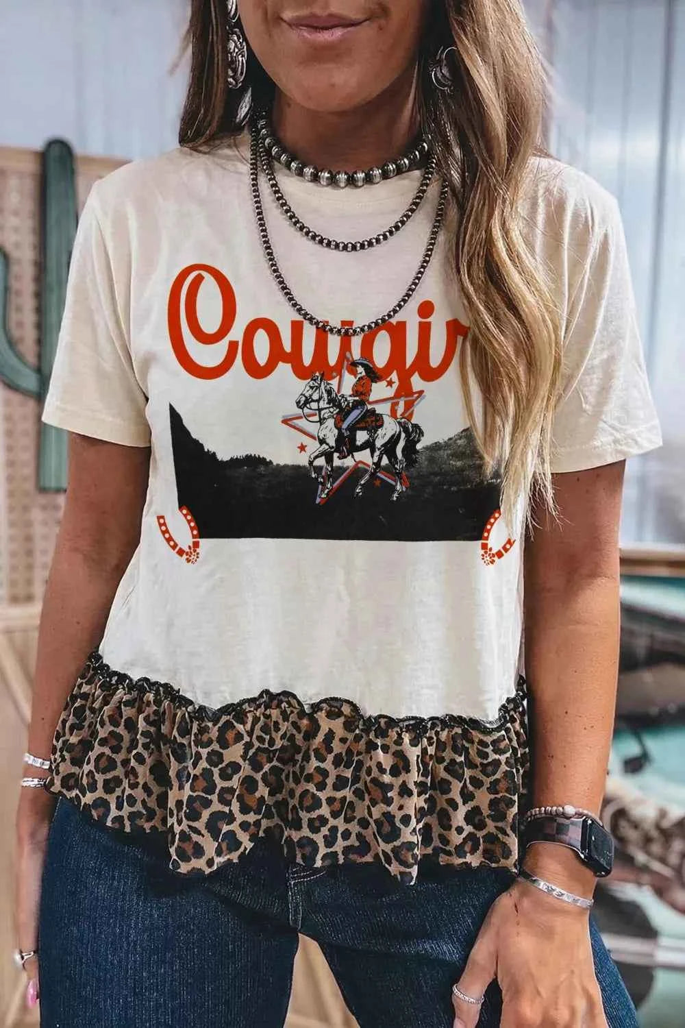 White cowgirl print Leopard Ruffle T-shirt by Trendsi featuring bold style, ruffled sleeves, and comfortable fit.