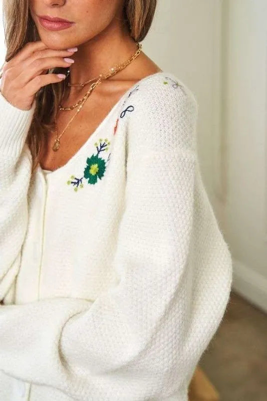 White Davi & Dani long sleeve cardigan with flower embroidery, button-up front, and classic design.