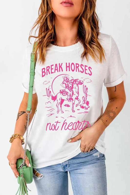 White graphic round neck T-shirt from Trendsi featuring a stylish design, perfect for everyday casual wear.