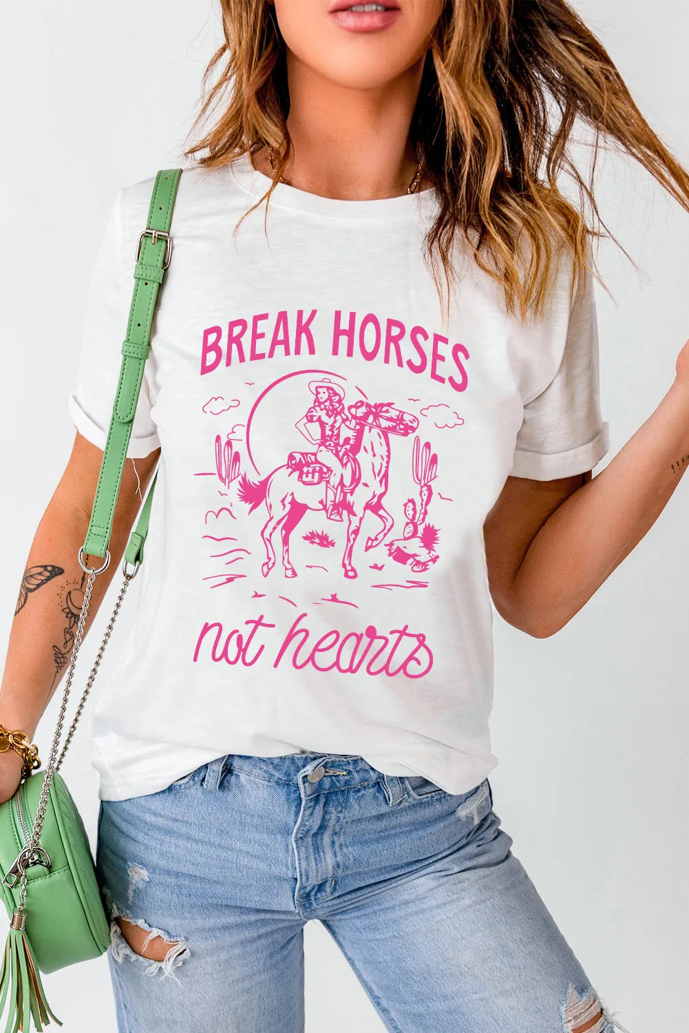 White graphic round neck T-shirt by Trendsi featuring a stylish design for everyday casual wear.
