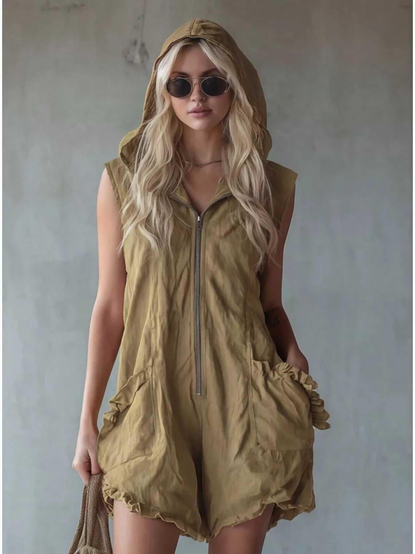 Plus size white hooded sleeveless zipper romper with ruffled pockets, trendy and comfortable by Trendsi.