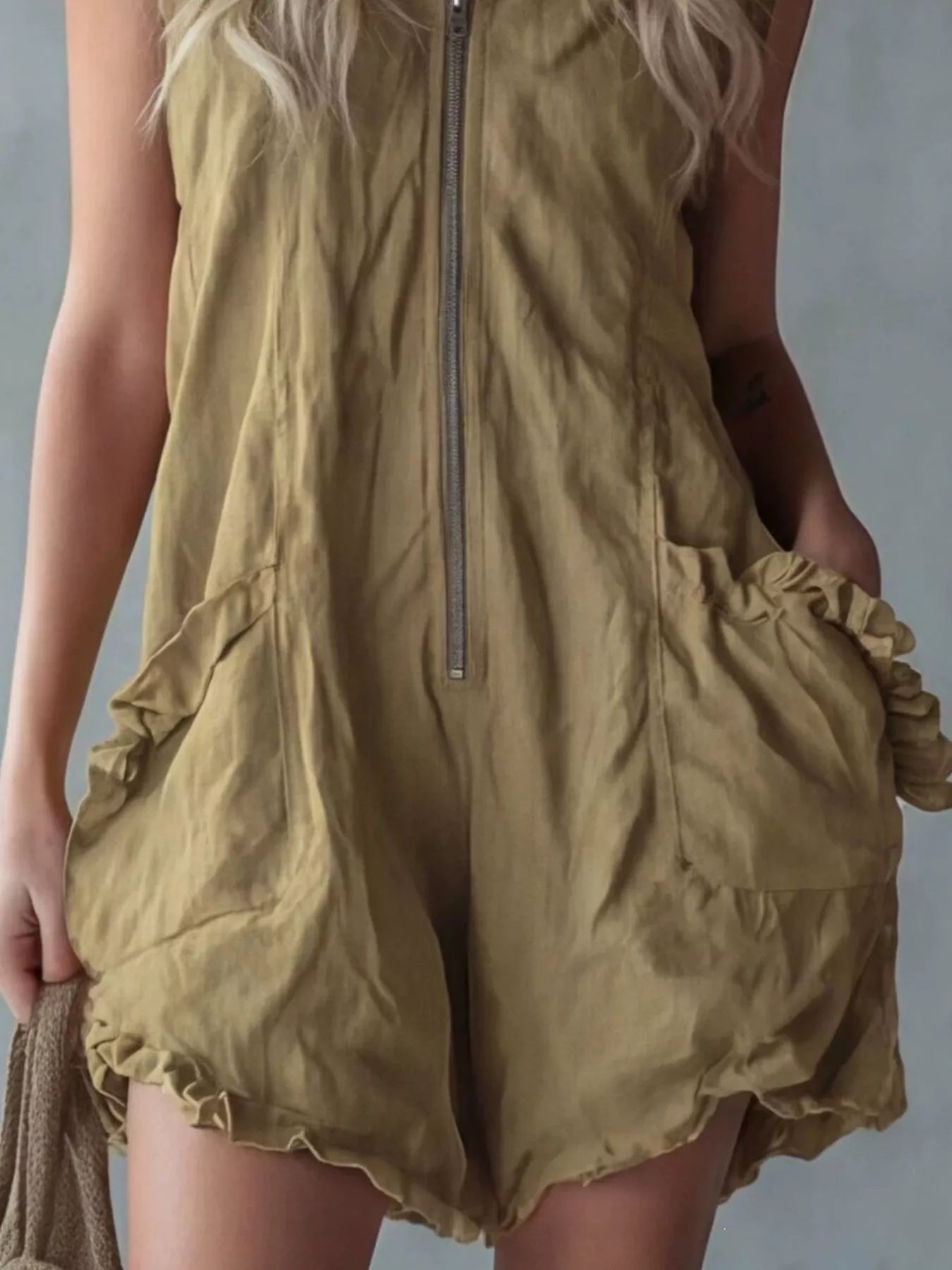 White full-size hooded sleeveless zipper romper with ruffled pockets, plus size trendy jumpsuit by Trendsi.