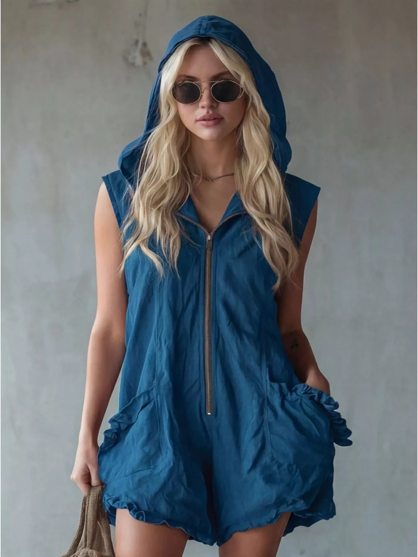 White full-size hooded sleeveless zipper romper with ruffled pockets, plus size trendy jumpsuit by Trendsi.