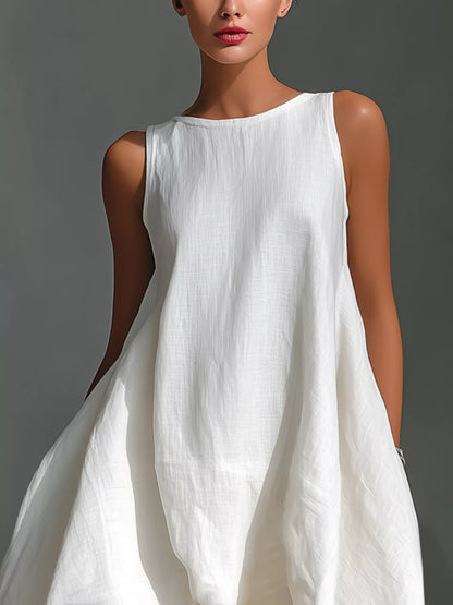 White high-low sleeveless dress with round neckline by Trendsi, flowing fabric and stylish design perfect for casual or dressy occasions.