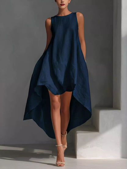 White high-low sleeveless dress with round neckline from Trendsi, shown on a model, perfect for casual or summer wear.