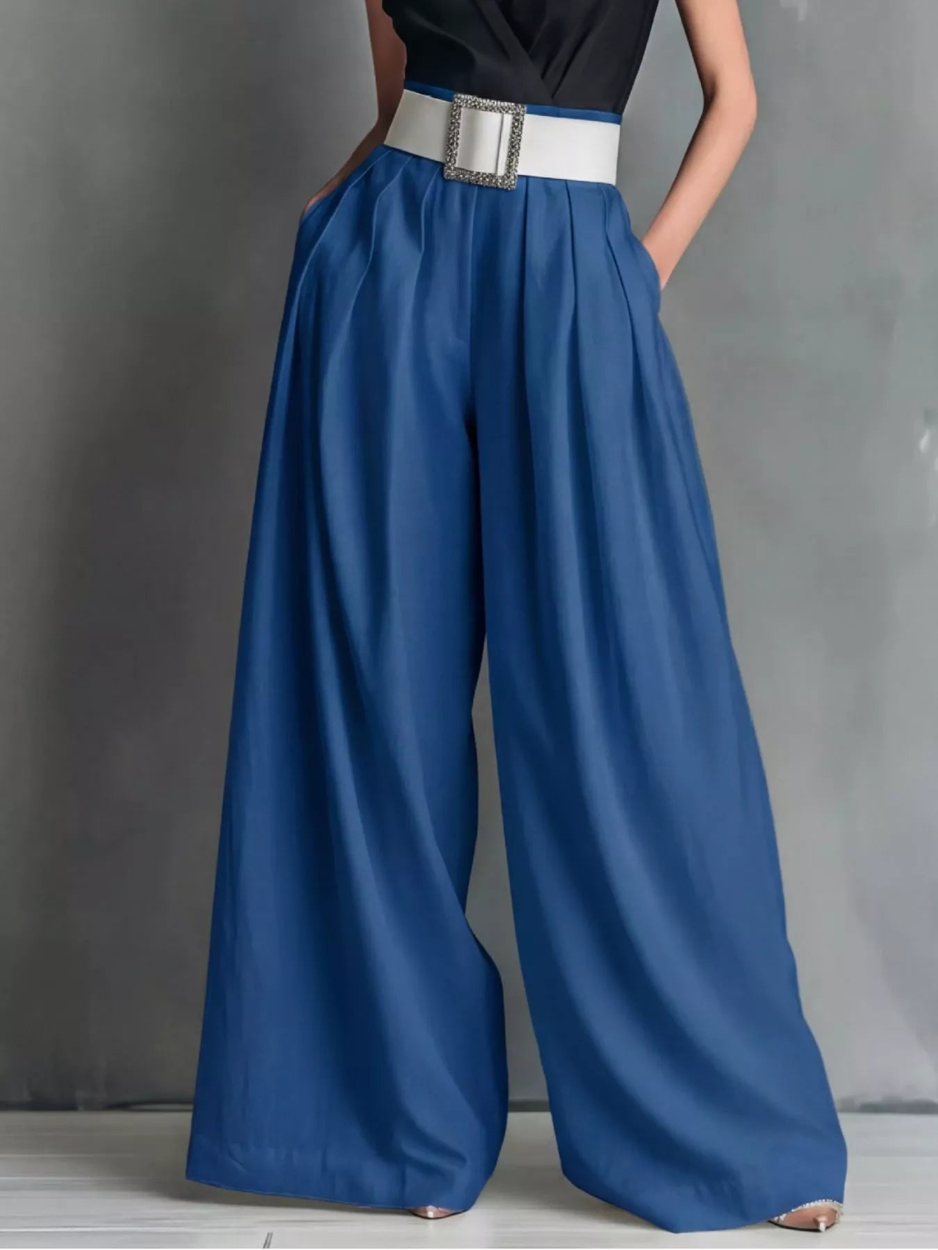 High-waisted wide-leg pants from Trendsi, featuring a relaxed fit and flowing fabric, shown in a stylish full-length view.