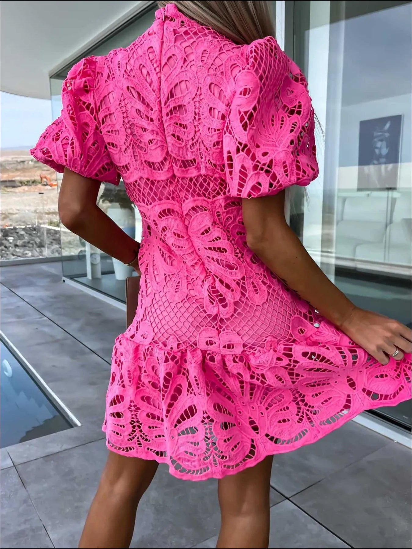 Lace mock neck puff sleeve dress by Trendsi featuring intricate lace fabric and stylish puff sleeves on a sleek silhouette.