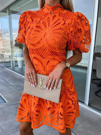 Lace mock neck puff sleeve dress by Trendsi featuring intricate lace fabric, high neckline, and voluminous puff sleeves.
