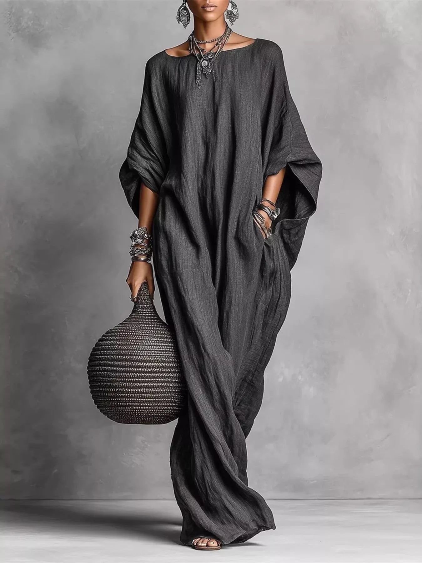 White loose fit boat neck maxi dress by Trendsi, flowing fabric, long length, and relaxed style for casual or elegant wear.
