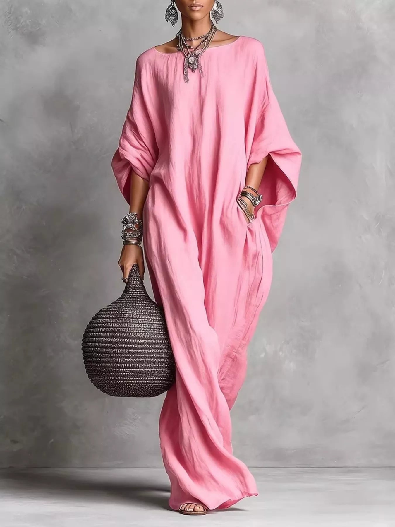 White loose-fit boat neck maxi dress by Trendsi, flowing fabric, long length, and relaxed style for casual or summer wear.
