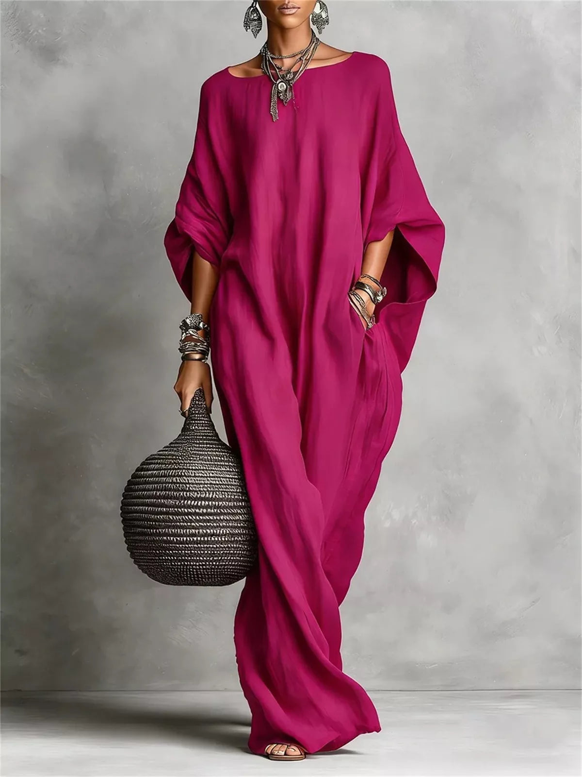 White loose fit boat neck maxi dress by Trendsi, flowing fabric with long sleeves and a relaxed silhouette.