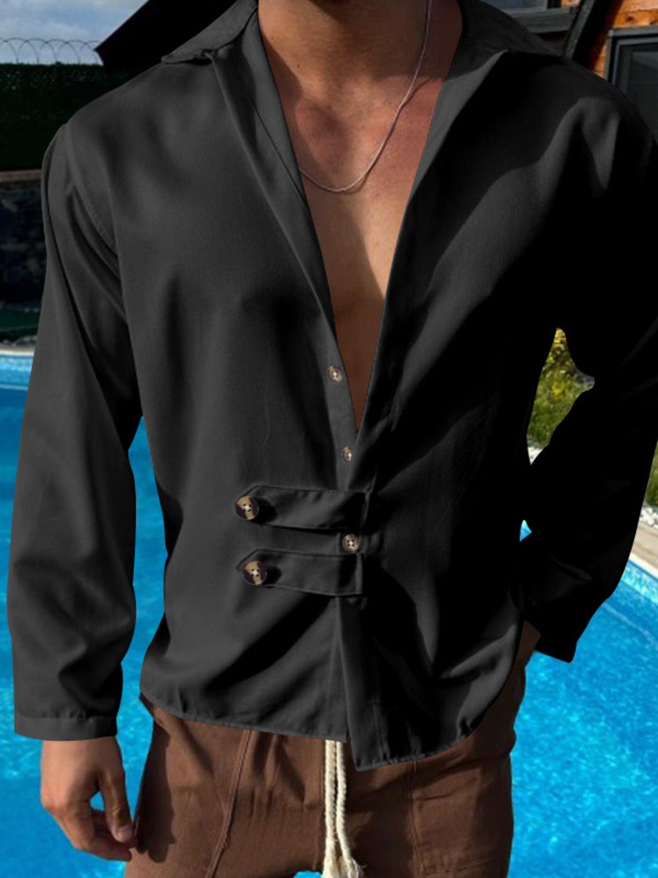 White men's full-size casual button-up shirt by Trendsi, displayed on a model, featuring a classic collar and long sleeves.