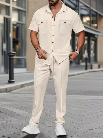 Men's casual short sleeve shirt and pants set in plus size by Trendsi, featuring a comfortable, relaxed fit in white.