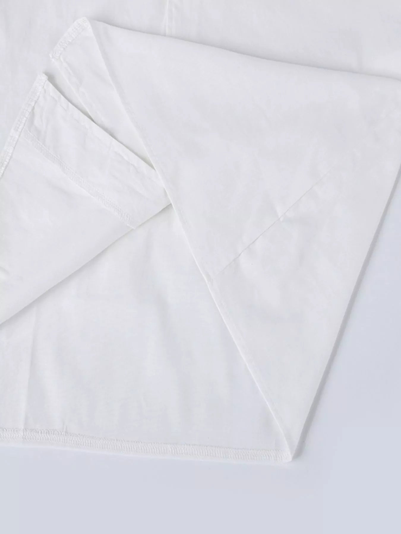 Men's full-size casual short-sleeve shirt by Trendsi in white, featuring a relaxed fit and comfortable fabric.