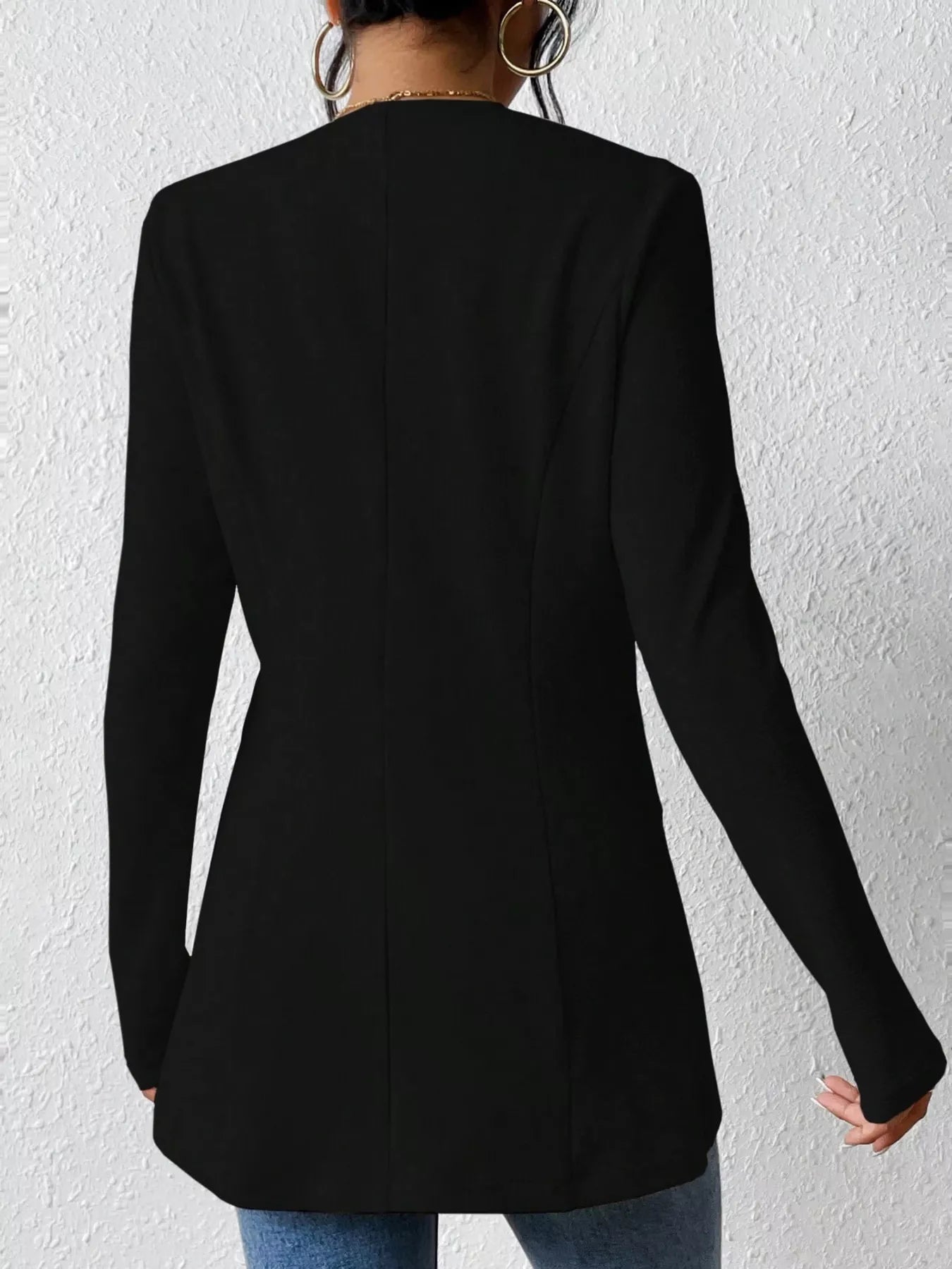 Black one-button long sleeve blazer by Trendsi, tailored fit with lapel collar and sleek design, perfect for professional or casual wear.