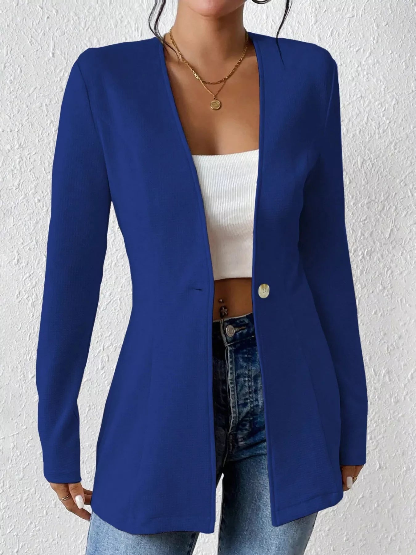 Navy one-button long sleeve blazer by Trendsi, tailored fit with lapel collar and sleek design, displayed on a mannequin.