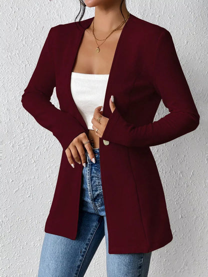Long sleeve blazer with single button closure from Trendsi, stylish and tailored for a polished look.