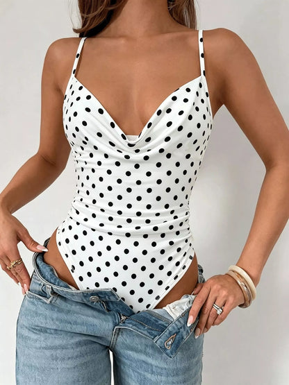 Polka dot cowl neck spaghetti strap bodysuit by Trendsi, featuring a stylish polka dot pattern and elegant cowl neckline.