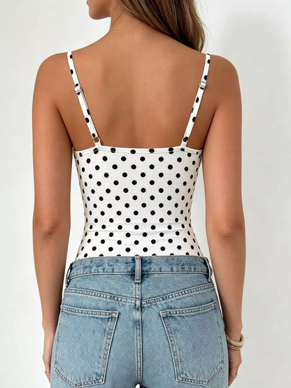 Polka dot cowl neck spaghetti strap bodysuit from Trendsi featuring a stylish design with a fitted silhouette and playful pattern.