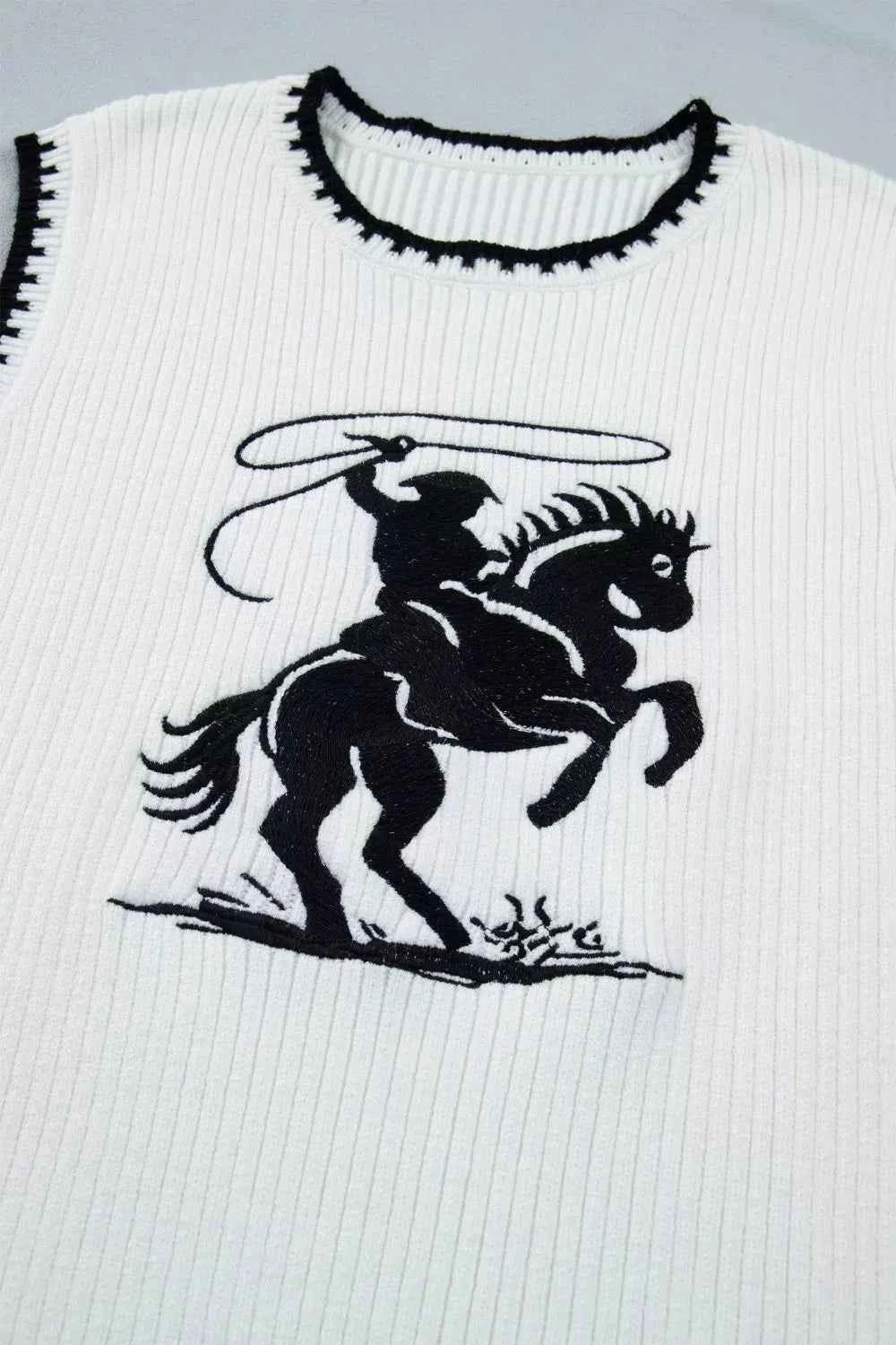 White Rodeo Cowboy Sweater Vest with contrast trim from Trendsi, featuring a classic Western-inspired design and comfortable fit.
