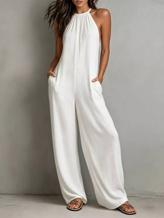 White sleeveless wide-leg jumpsuit by Trendsi, featuring a stylish fit and flowy design perfect for casual or dressy occasions.
