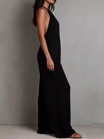 White sleeveless wide leg jumpsuit by Trendsi, featuring a relaxed fit and stylish design for casual or dressy occasions.