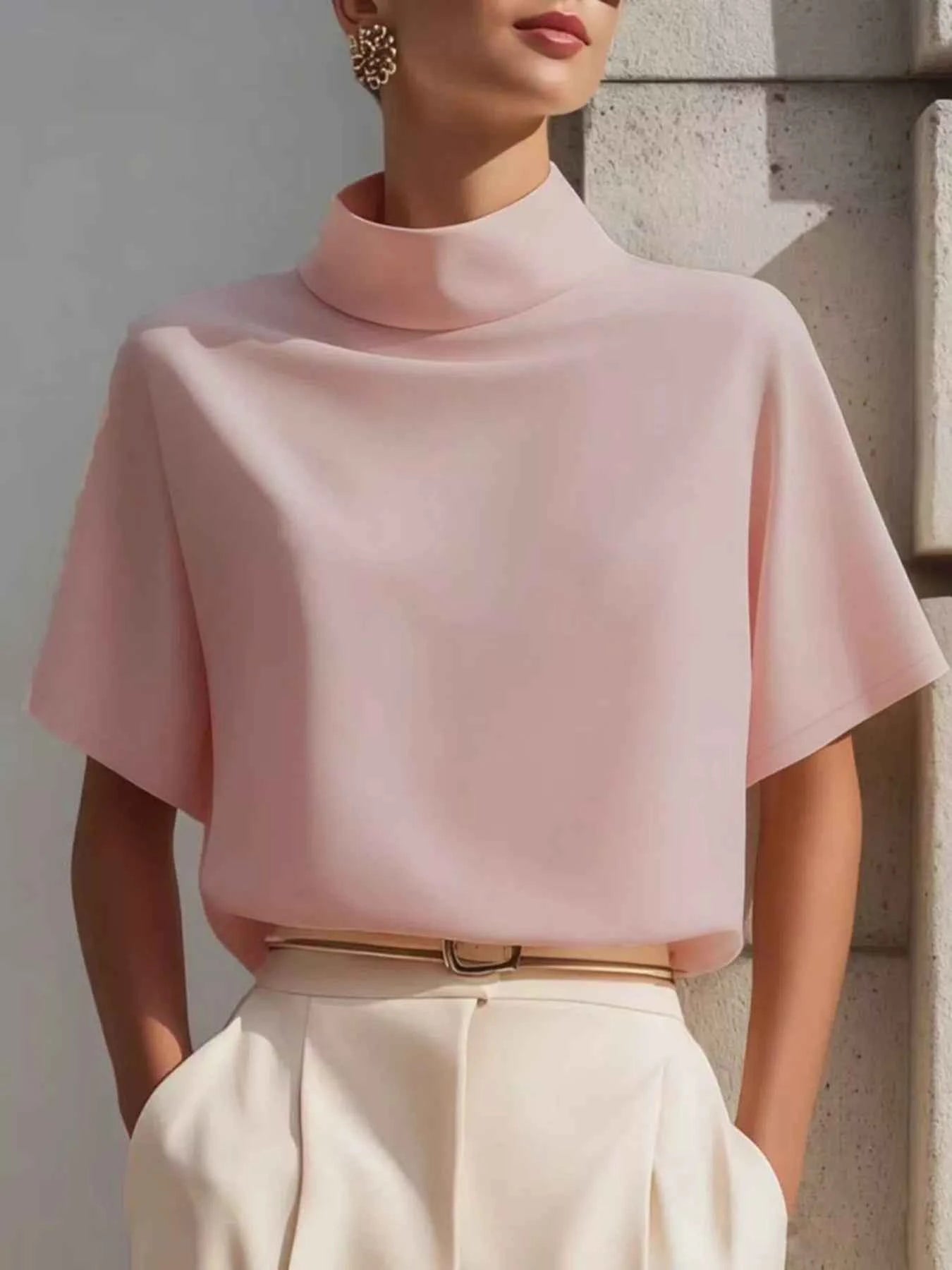 Blush pink women's mock neck short sleeve T-shirt by Trendsi, stylish and casual top for effortless everyday elegance.