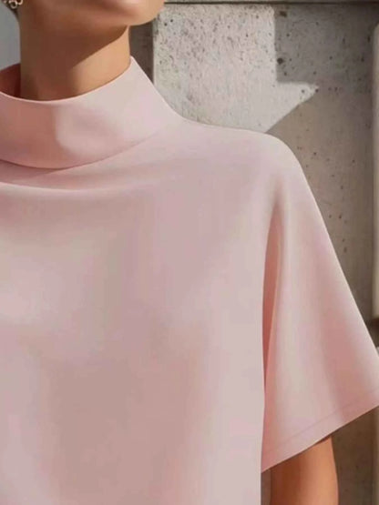 Blush pink women's mock neck short sleeve T-shirt by Trendsi, stylish and perfect for effortless everyday elegance.