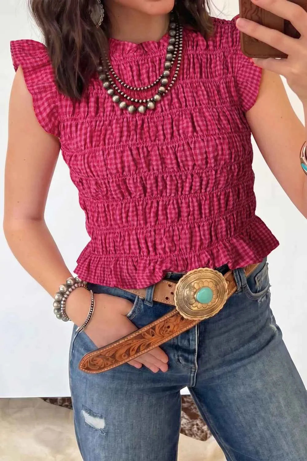 Women's smocked gingham tank top with ruffle sleeves, stylish and effortless, by Trendsi. Bright cerise color, perfect for casual wear.