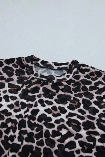 Leopard print sheer mesh top for women, stylish and versatile, featuring a chic design and lightweight fabric.