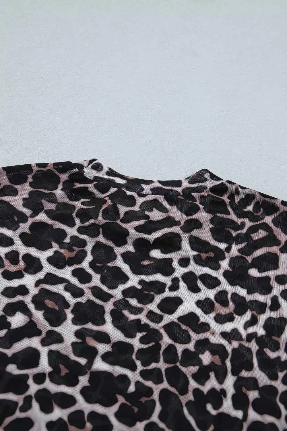 Chic leopard print sheer mesh top for women, featuring trendy style and versatile design, perfect for effortless fashion.